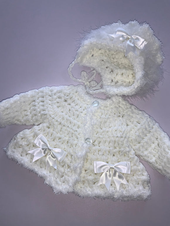 Crocheted cardigan and bonnet 06242344