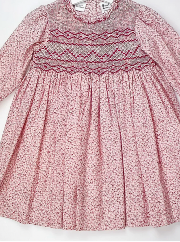 Sarah-louise Hand smocked dress.        1021623